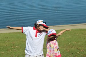 Two kids are posing